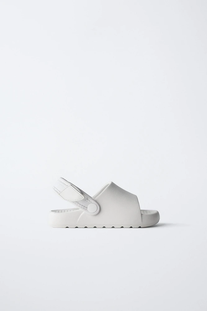 RUBBER SLINGBACK SANDALS
