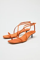 SATIN-EFFECT CROSSED STRAP SANDALS