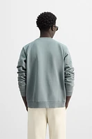 CREW NECK POCKET SWEATSHIRT