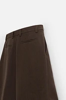 TEXTURED PLEATED SHORTS