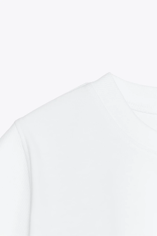 T-SHIRT SANS MANCHES EFFET DÉLAVÉ