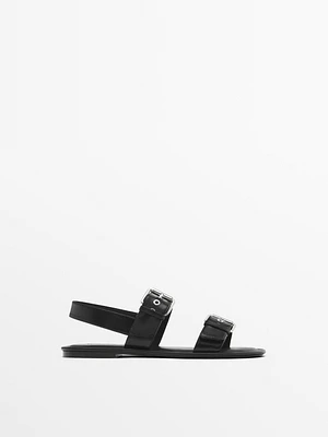 Flat slider sandals with buckles