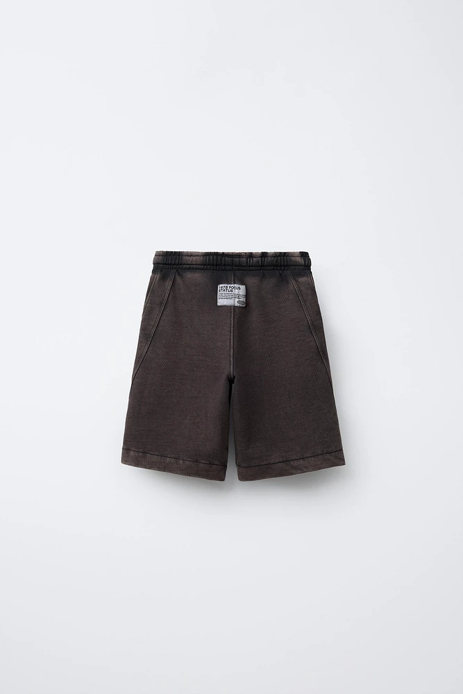 WORN EFFECT PLUSH SHORTS