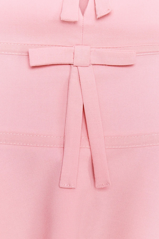 HAUT BUSTIER À NŒUDS