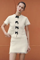FRAYED MINI SKIRT