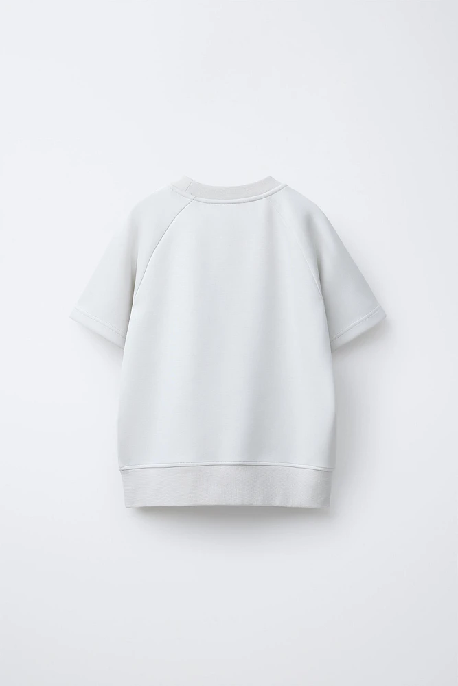 SWEAT MANCHES COURTES SPORTIF