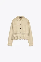 BLOUSON AJOURÉ EFFET DAIM