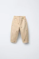PANTALON EN SERGÉ BALLON BRODÉ FLEURS