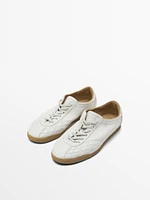 White topstitched trainers
