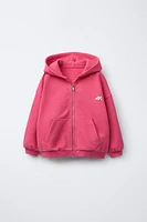 SWEAT À CAPUCHE ET LOGO