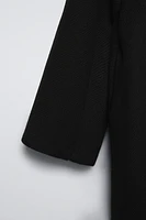 MANTEAU CONTENANT DE LA LAINE