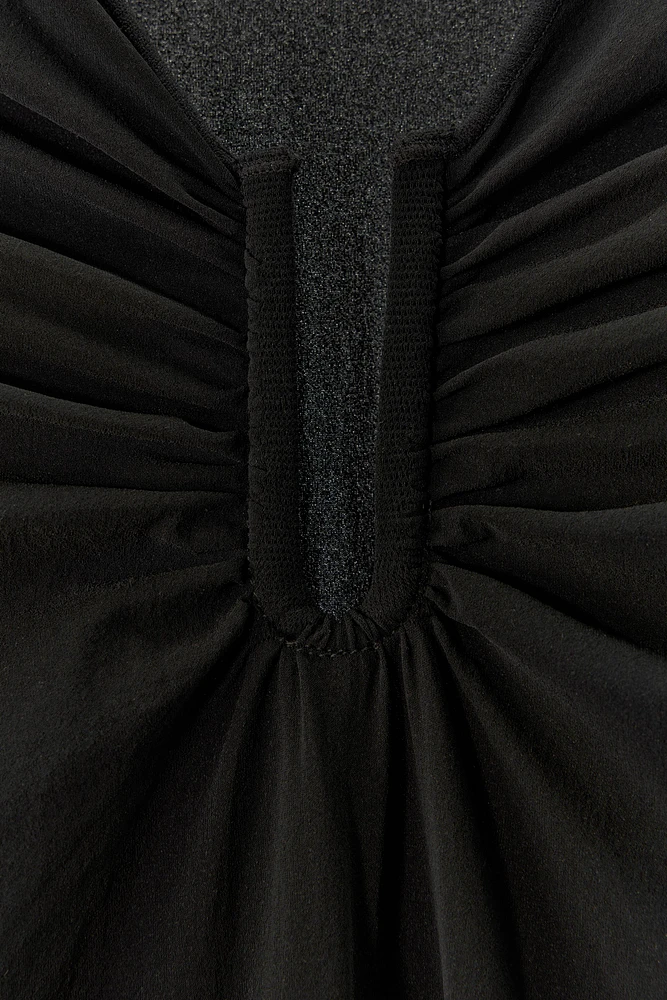 STOCKING BODYSUIT WITH METAL APPLIQUÉ