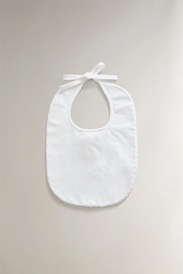 CHILDREN'S BIB WITH TRIM