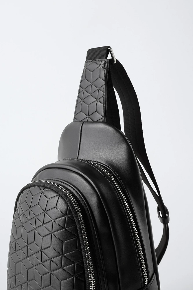 EMBOSSED CROSSBODY BACKPACK