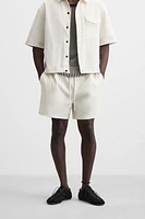 BERMUDA RELAXED FIT DÉLAVÉ