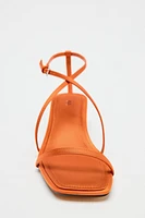 SATIN-EFFECT CROSSED STRAP SANDALS
