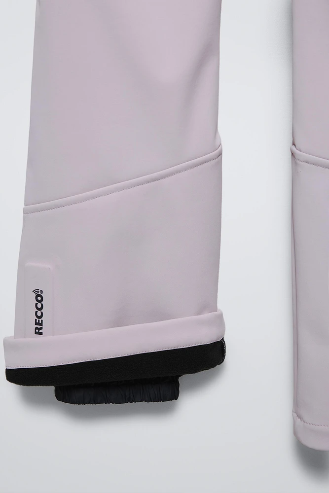 WINDPROOF AND WATER REPELLENT DOWN JUMPSUIT RECCO® SYSTEM SKI COLLECTION