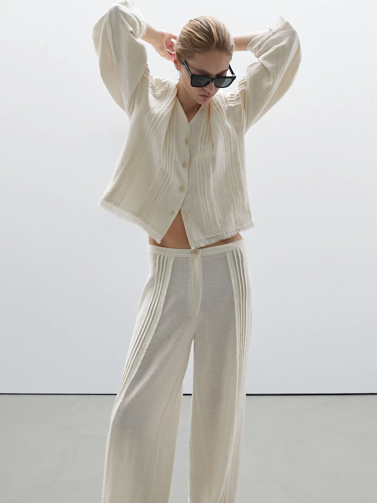 Pantalon avec broderies en coton mélangé