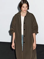Technical fabric trench coat with button detail