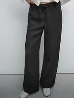 Linen suit trousers with frayed detail