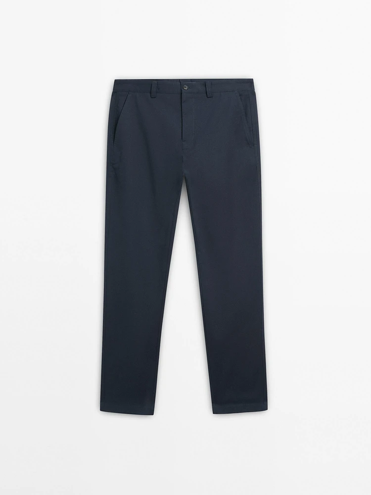 Slim fit cotton blend trousers.
