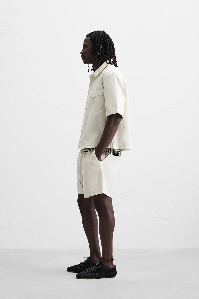 BERMUDA RELAXED FIT DÉLAVÉ