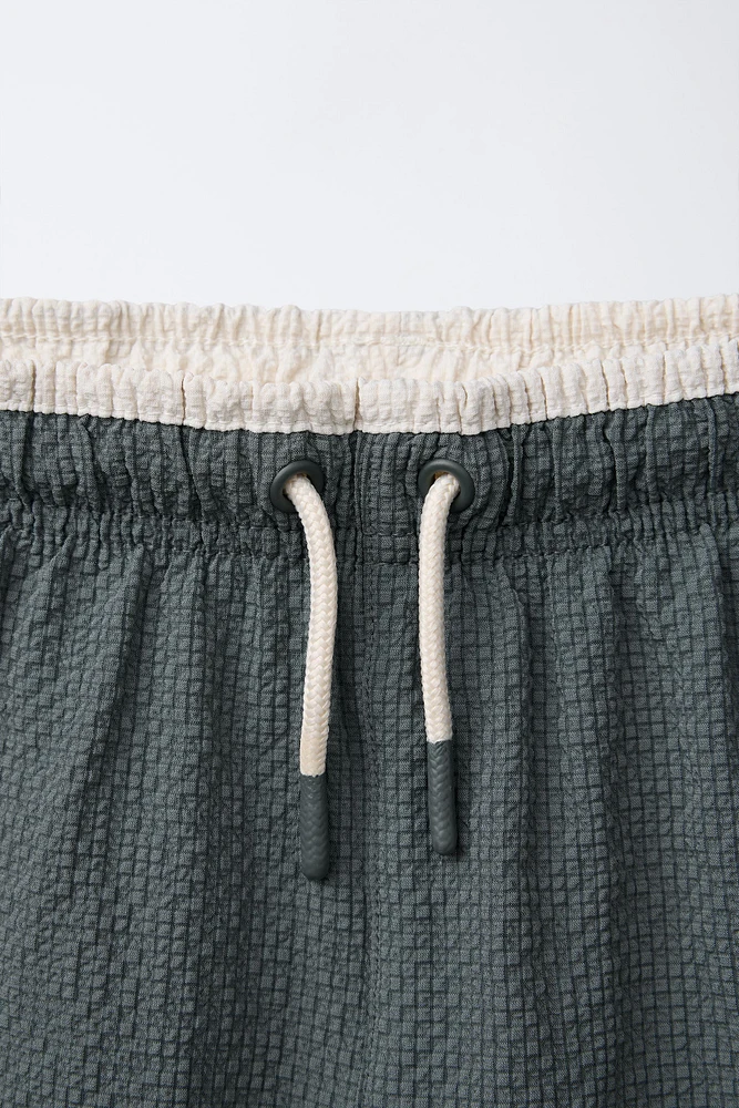 6-14 ANS/ SHORT DE BAIN TEXTURÉ
