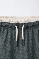 6-14 ANS/ SHORT DE BAIN TEXTURÉ