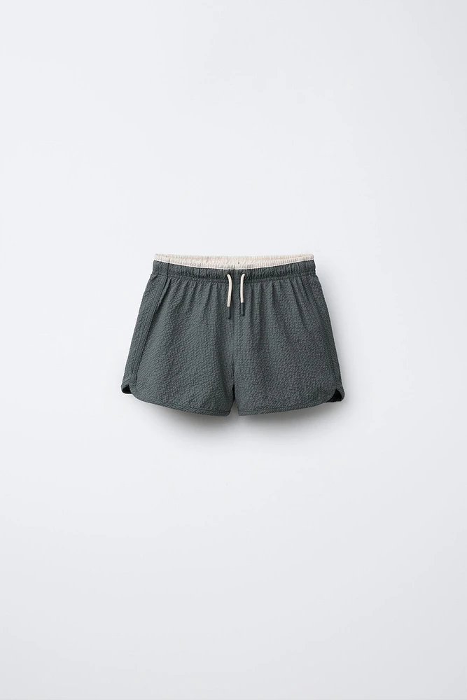 6-14 ANS/ SHORT DE BAIN TEXTURÉ