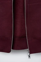SWEAT À CAPUCHE ET ZIP