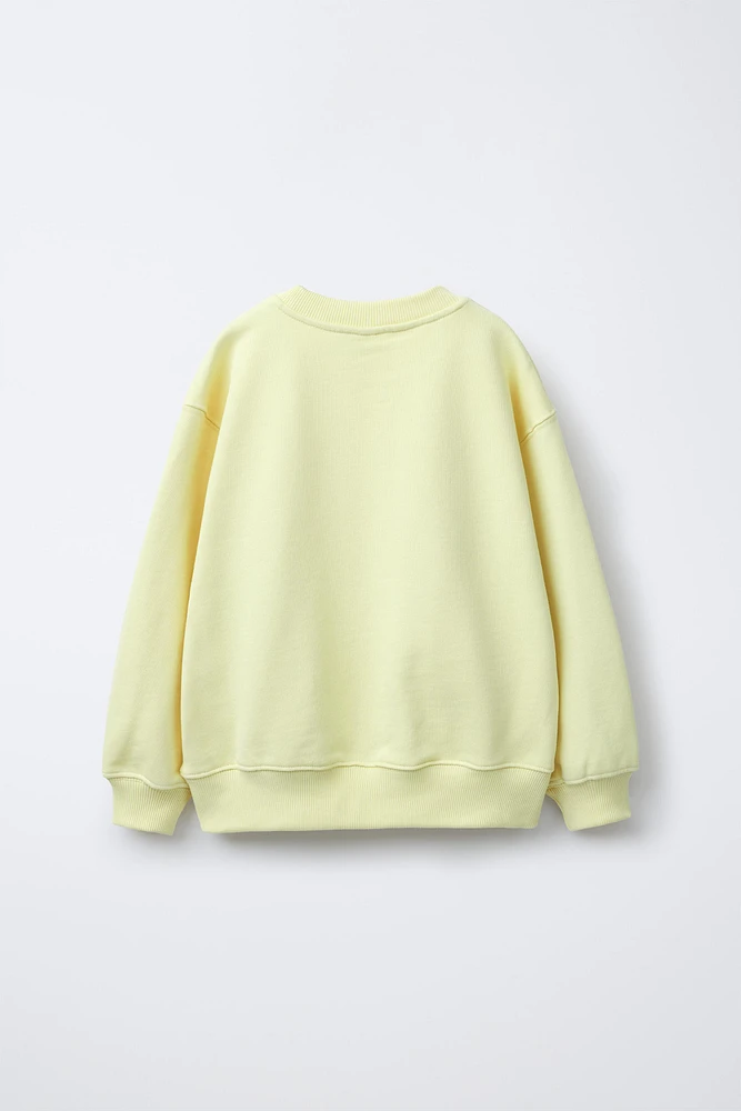 RAISED FLORAL SWEATSHIRT