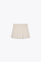 JUPE-SHORT À PLIS PLATS