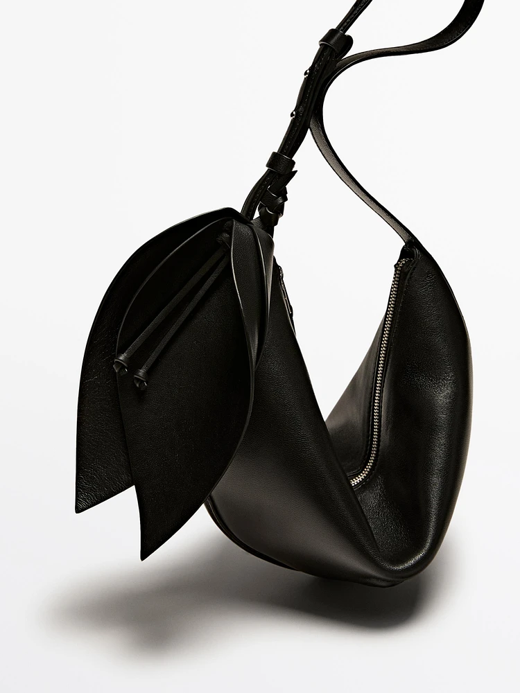 Nappa leather half-moon bag with flower detail