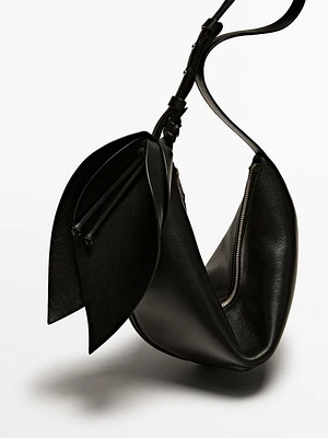 Nappa leather half-moon bag with flower detail