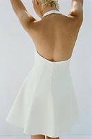 SHORT HALTER GODET DRESS