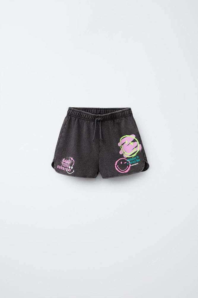 SMILEYWORLD ® WASHED EFFECT PLUSH SHORTS