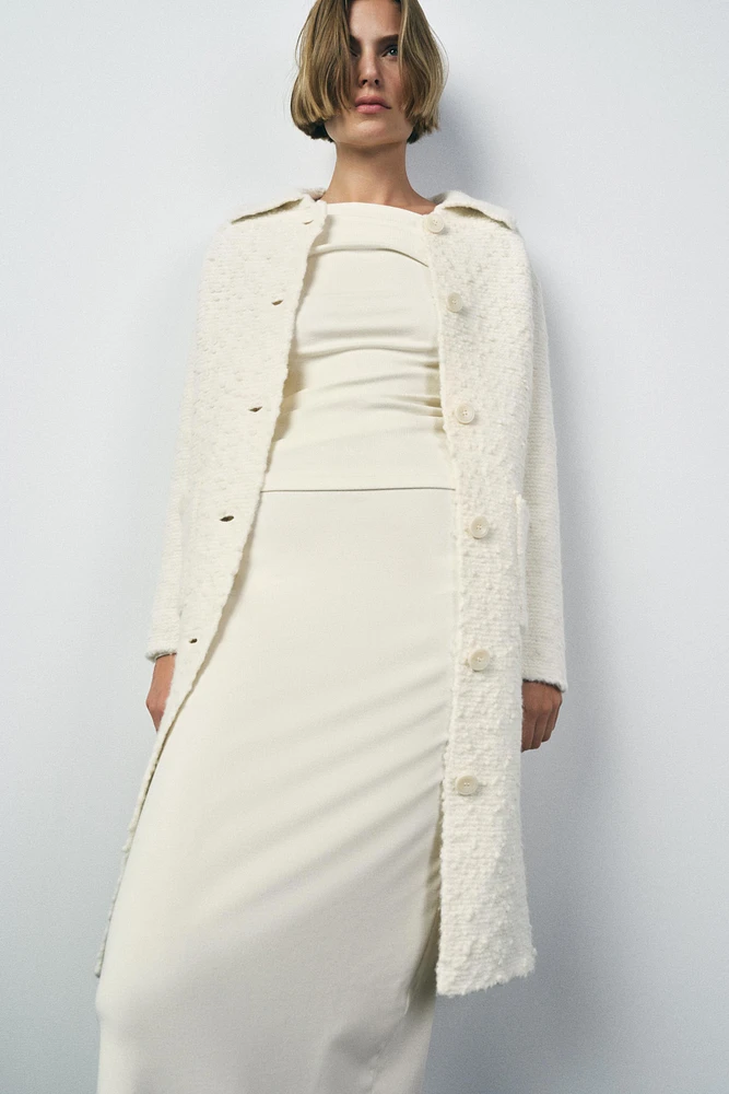 MANTEAU EN MAILLE AVEC LAINE