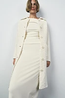 MANTEAU EN MAILLE AVEC LAINE