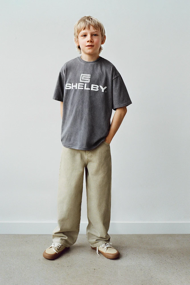 T-SHIRT EFFET DÉLAVÉ AVEC INSCRIPTION IMPRIMÉE