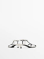 Sandales à talon avec brides en cuir