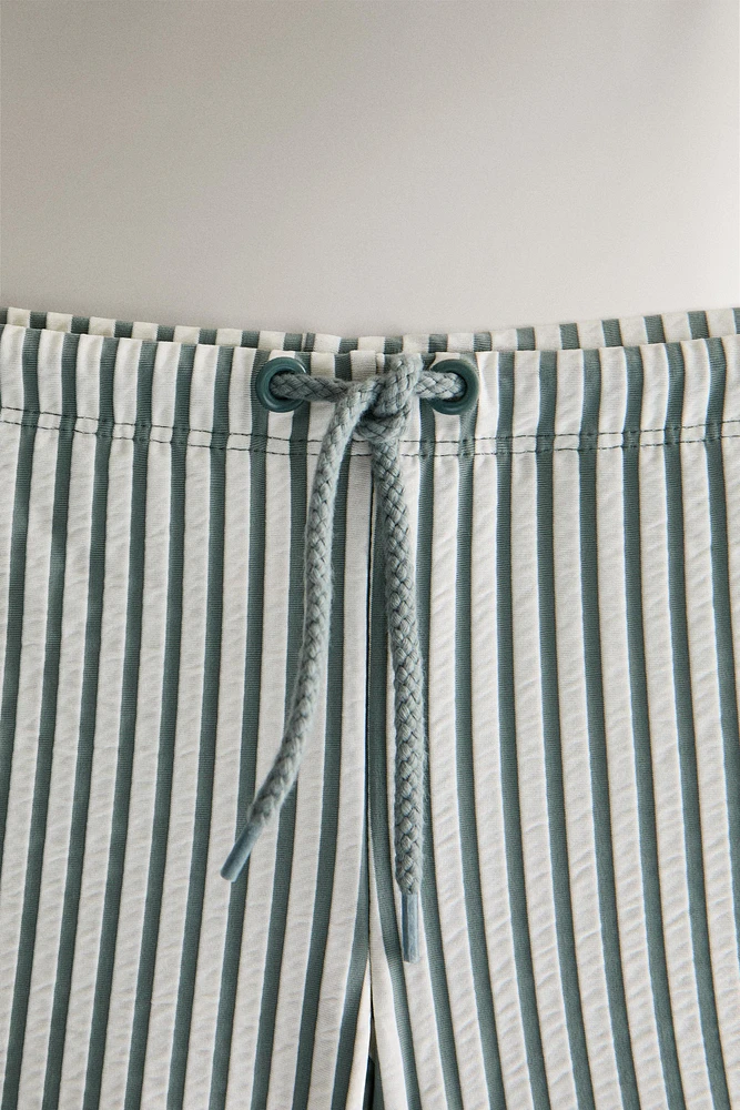 CHILDREN’S STRIPED BEACH SWIMMING TRUNKS