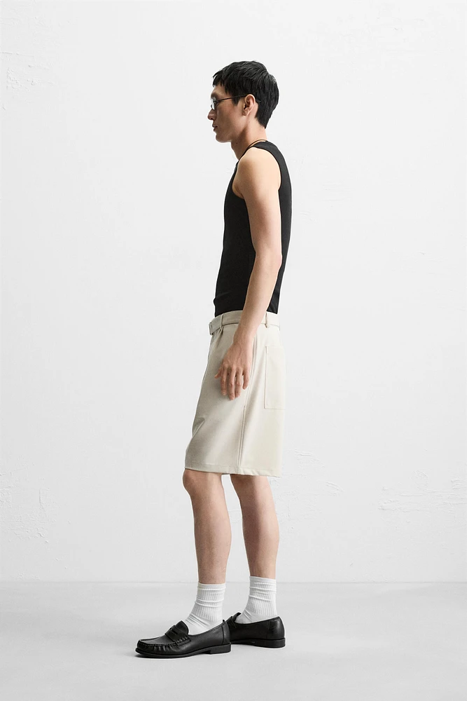 PLEATED BERMUDA SHORTS WITH BELT