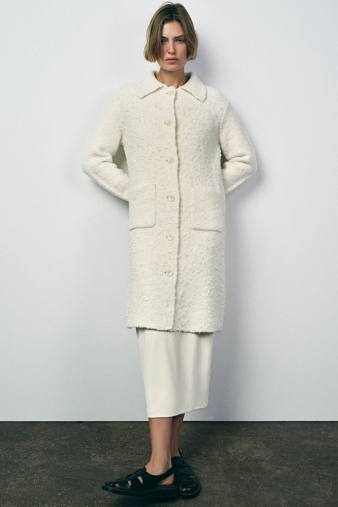 MANTEAU EN MAILLE AVEC LAINE