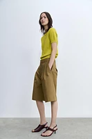 TOP RUSTIQUE EN MAILLE UNI