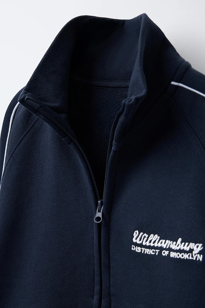 PLUSH SWEATSHIRT WITH TEXT