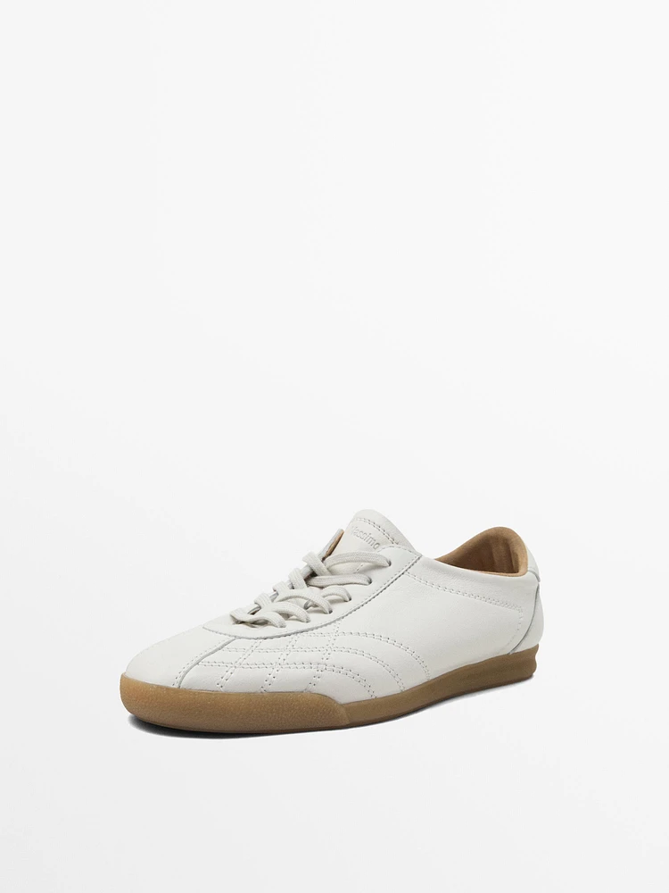 White topstitched trainers