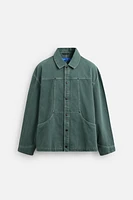 VESTE DÉLAVÉE SURPIQÛRES CONTRASTÉES