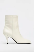 BOTTINES SURPIQÛRES CUIR