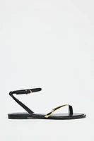 FLAT SANDALS WITH DETAIL