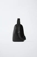 EMBOSSED CROSSBODY BACKPACK